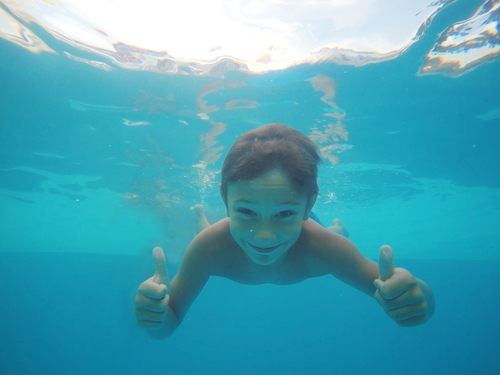 child swimming