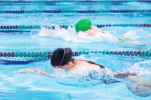 swimmers competing in swim meet